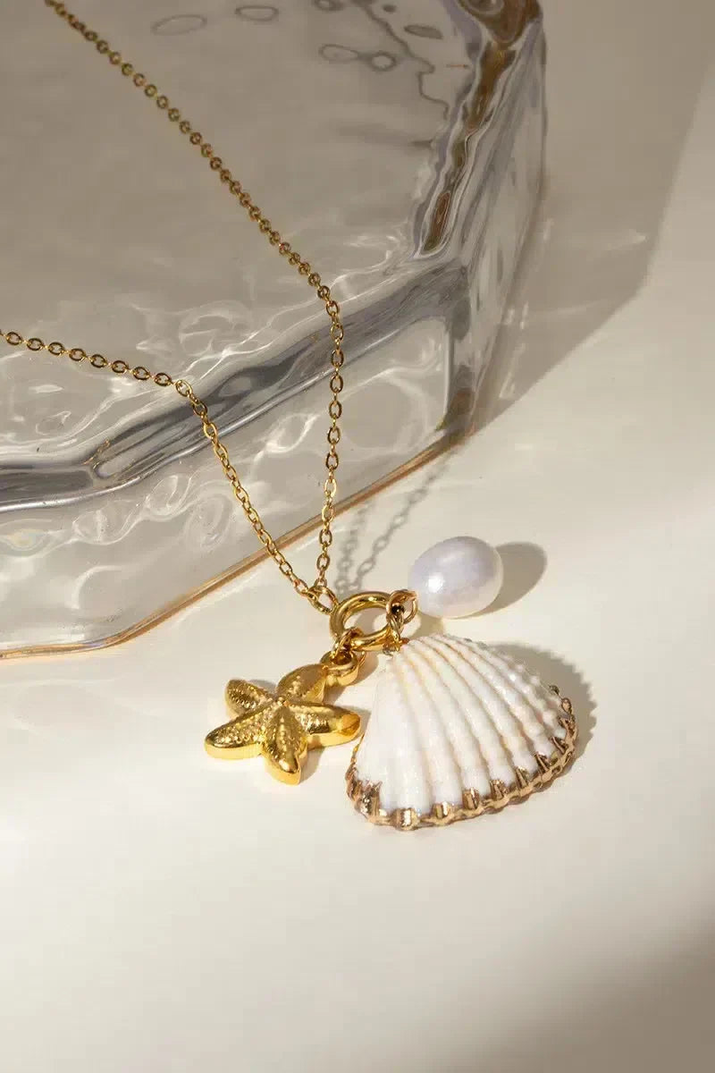 Ketting met zeester en parel - Speelse en zomerse uitstraling