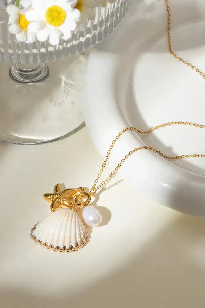 Ketting met zeester en parel - Speelse en zomerse uitstraling