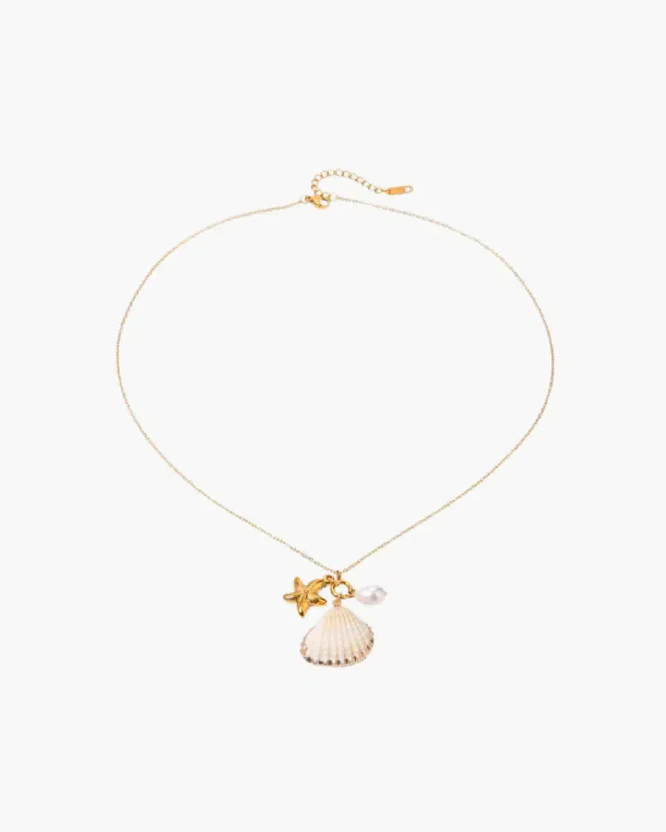 Ketting met zeester en parel - Speelse en zomerse uitstraling
