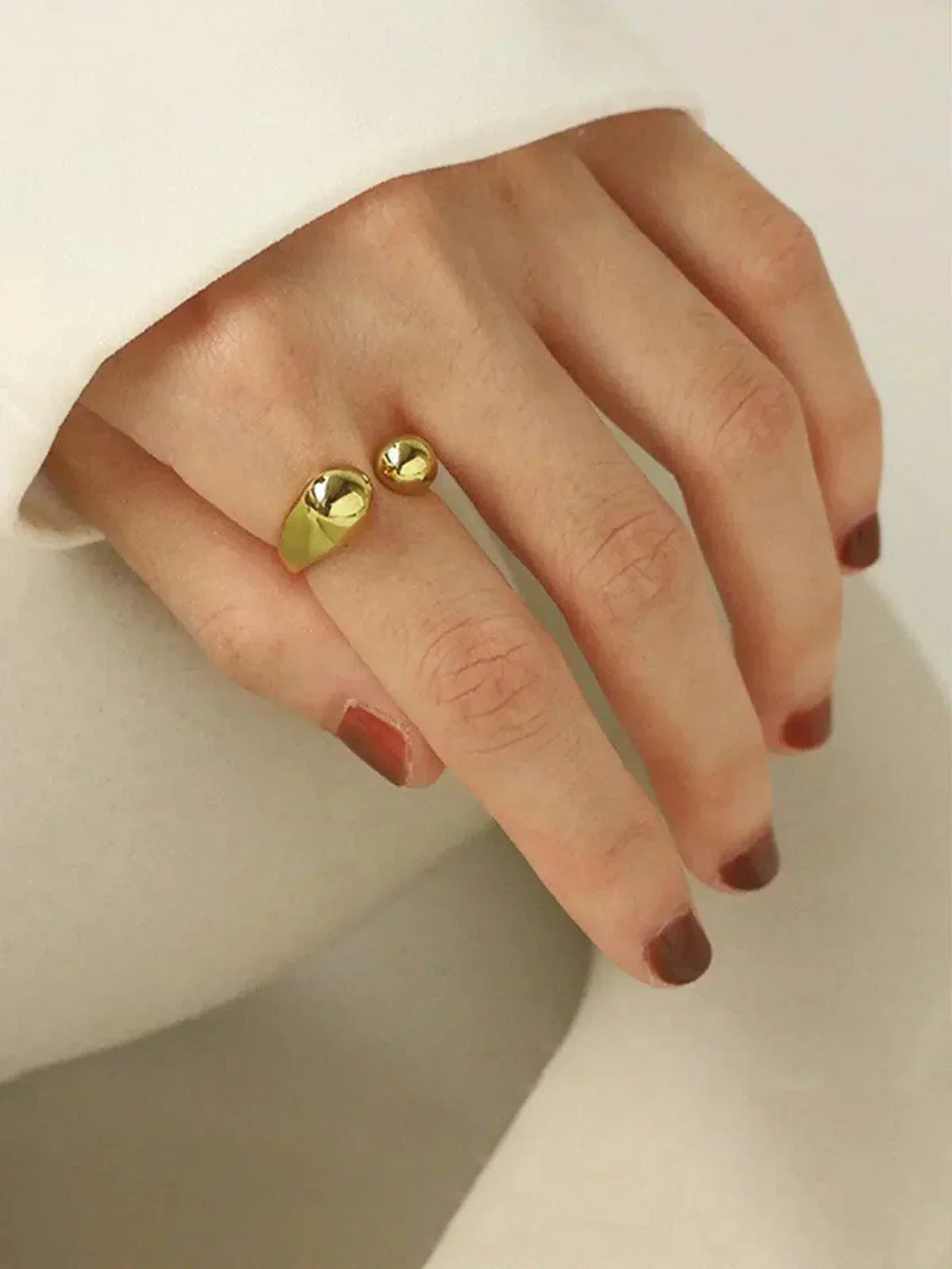 Minimalistische goudkleurige open ring - Gepolijst druppel-ontwerp